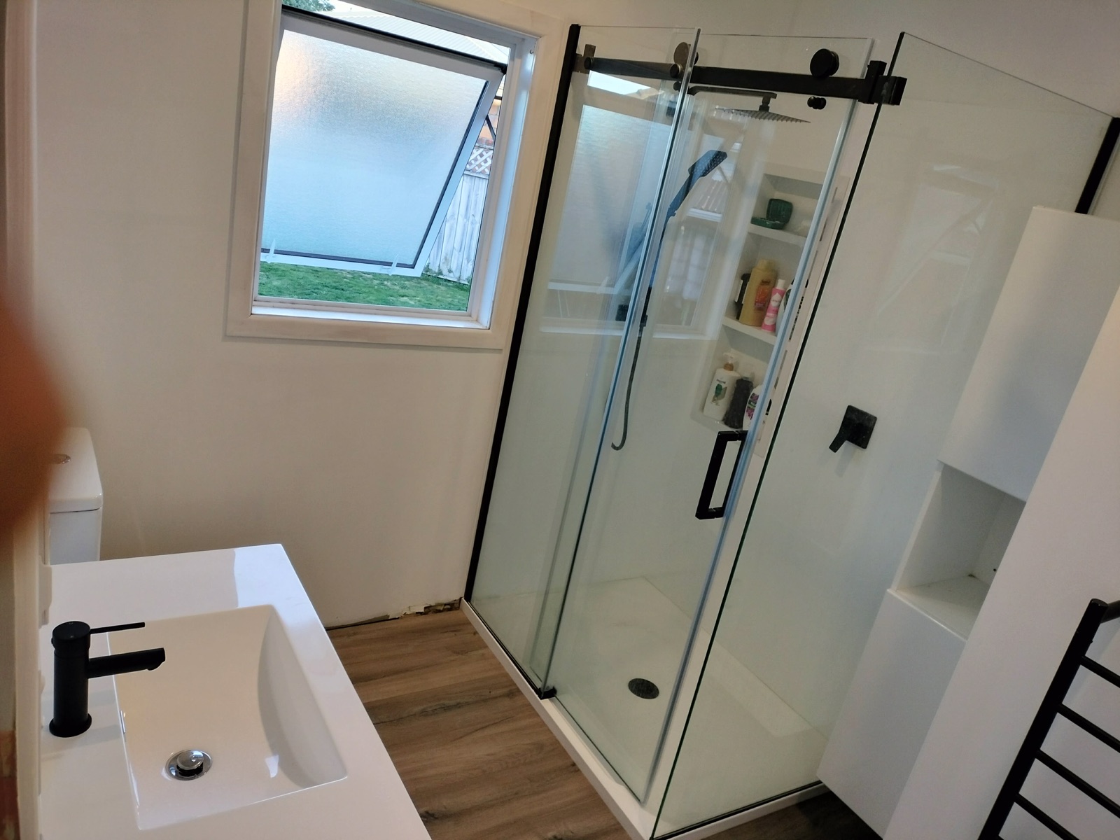 Bathroom vanity & tiled shower
